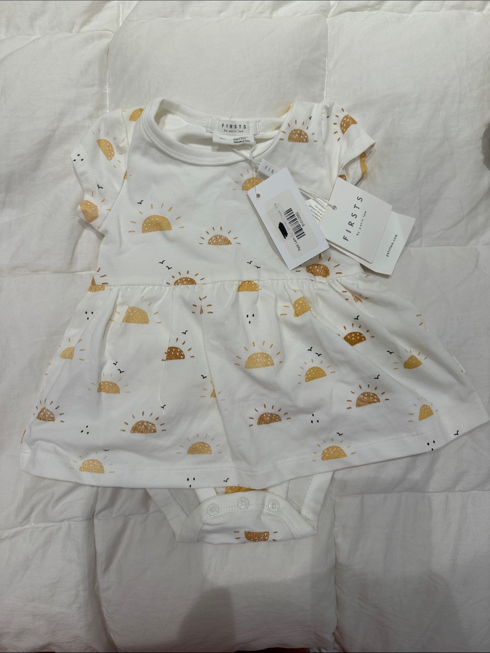 Petit Lem White Onesie Dress with Gold Sun Print